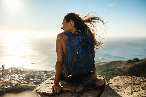 Hiker relaxing on mountain top