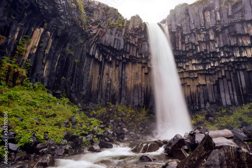 Vertical composition of the impressive Svartifoss waterfall