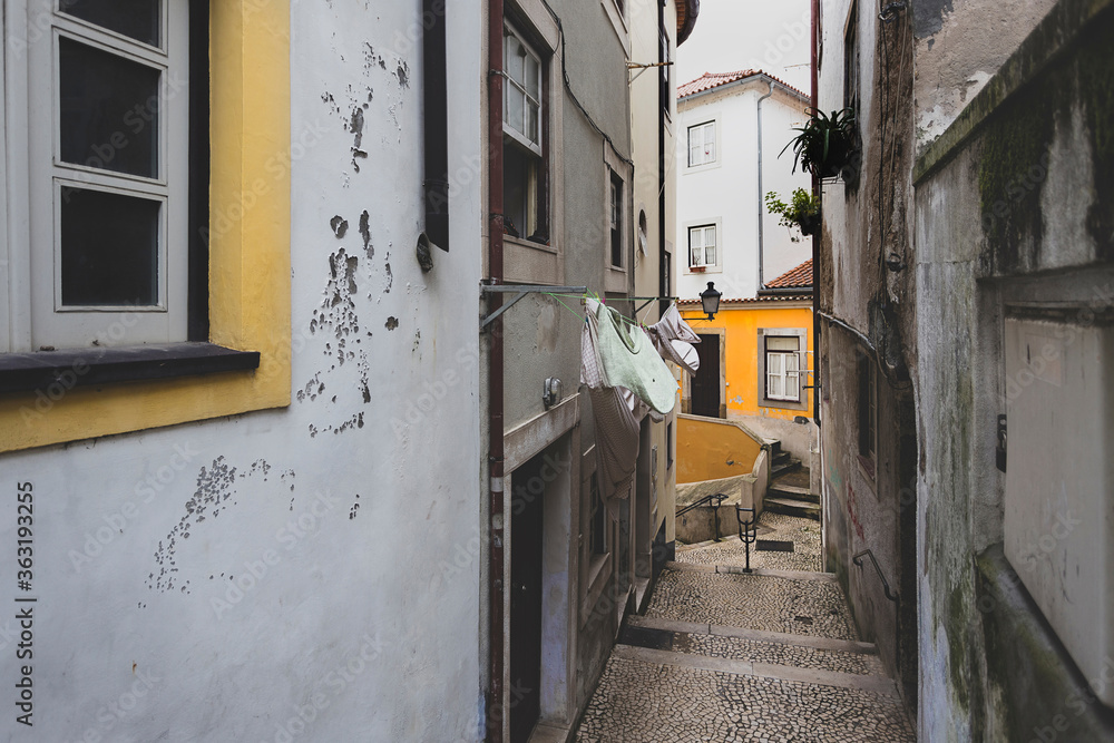 Streets of a small town with clothes hanging on the houses Streets of a small town with clothes hanging on the houses