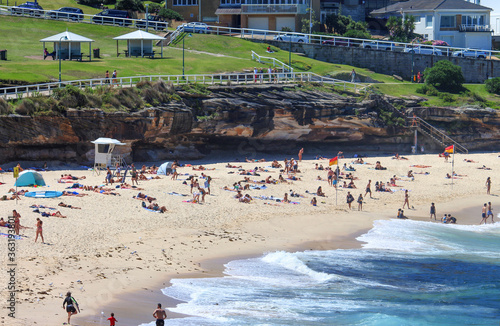 The beach with cliff and park in background. Bronte beach, Sydney Australia © Rose Makin