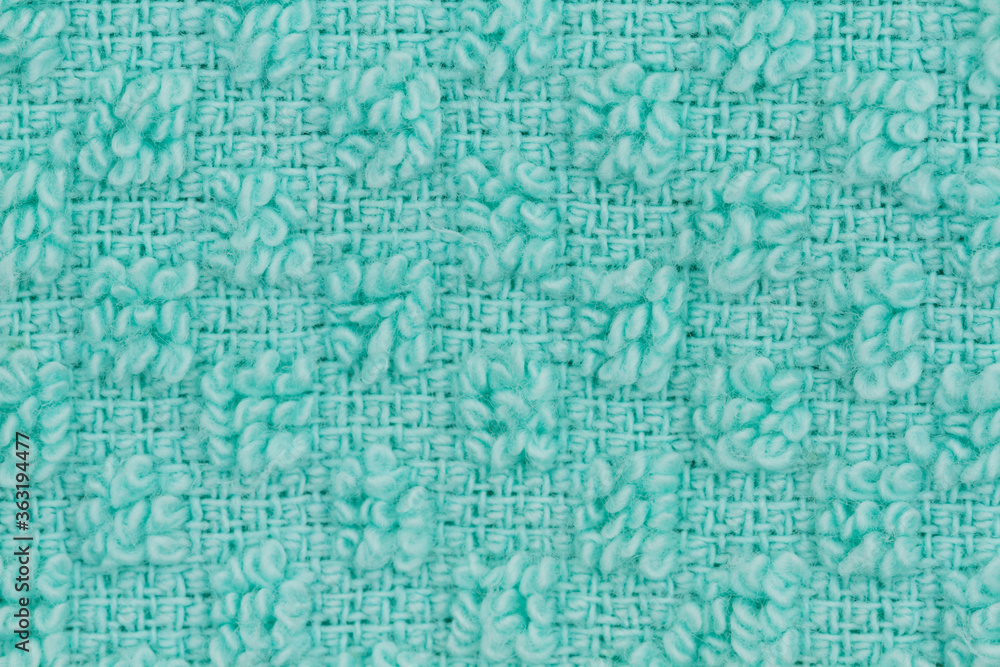 Teal knit textured weave material background
