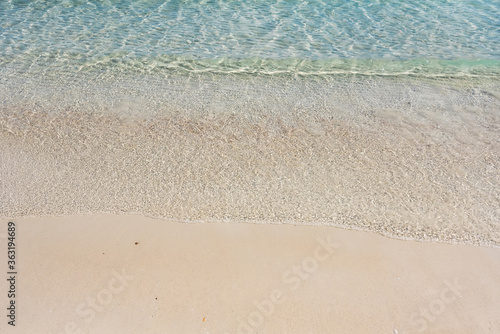 Beach and sea background, Sand and bubble, wave. Soft wave on sandy beach. Background. © bubbers