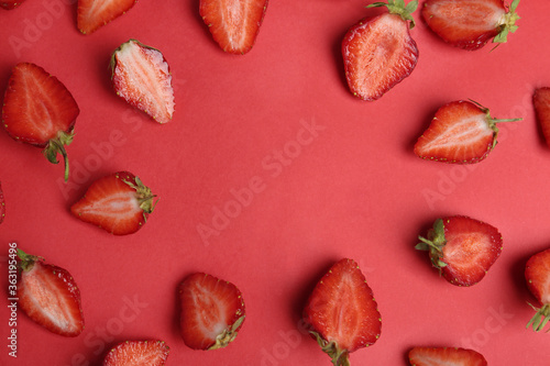 Tasty ripe strawberries on red background, flat lay. Space for text