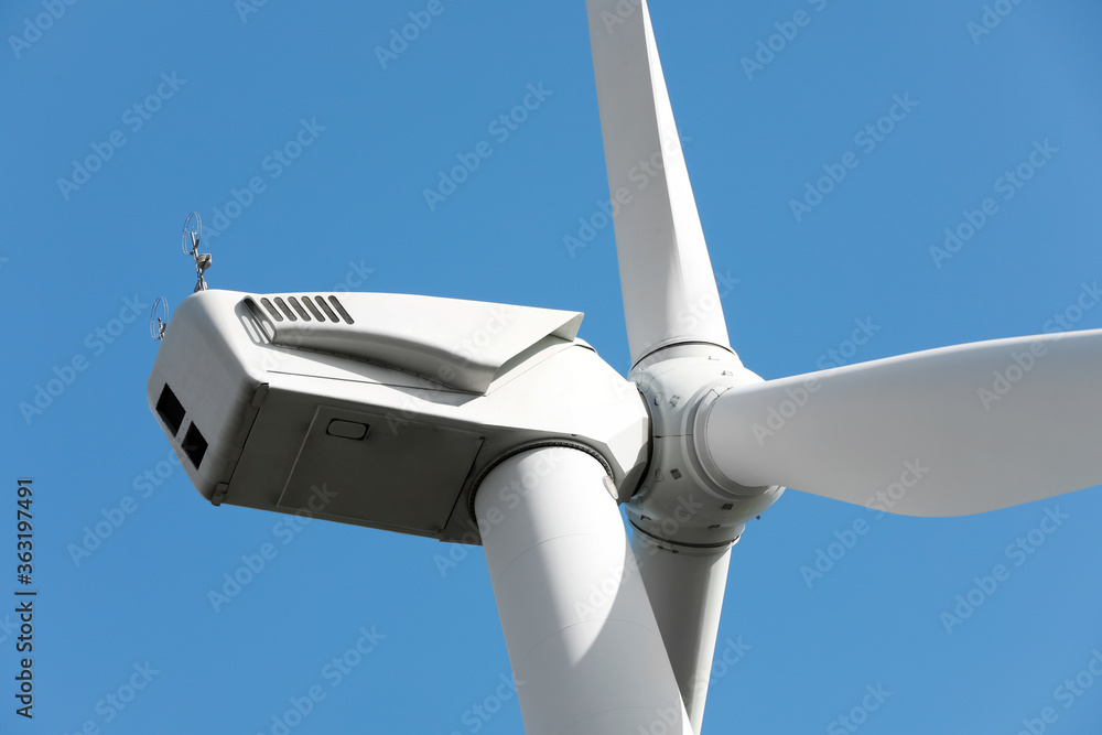 Wind turbine against beautiful sky, closeup. Alternative energy source Wind turbine against beautiful sky, closeup. Alternative energy source