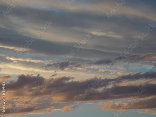Dramatic sunset with twilight color sky and clouds. Nature abstract composition