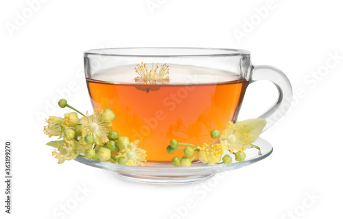 Cup of tea and linden blossom on white background