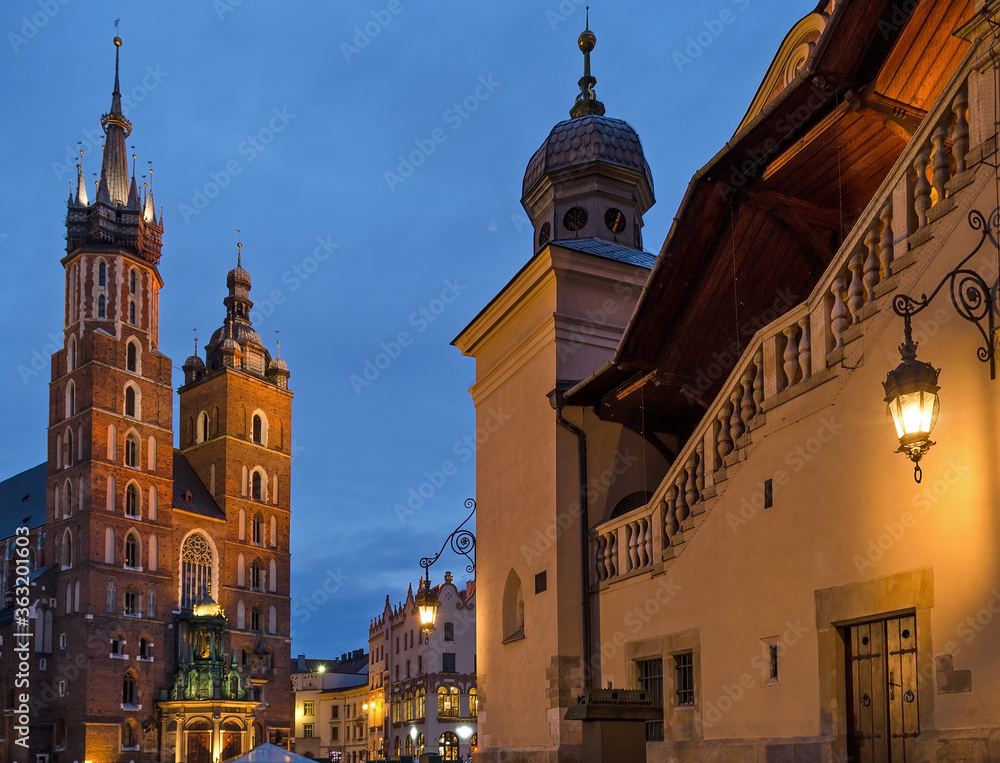 Cloth Hall and Town Hall Tower illuminated at sunrise - Krakow, Poland