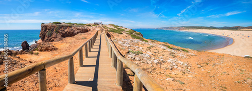 wooden boardwalk to bordeira beach, algarve Portugal