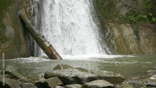 Slow Motion of Pruncea Waterfall with Fresh and Cold Waters, Romania photo