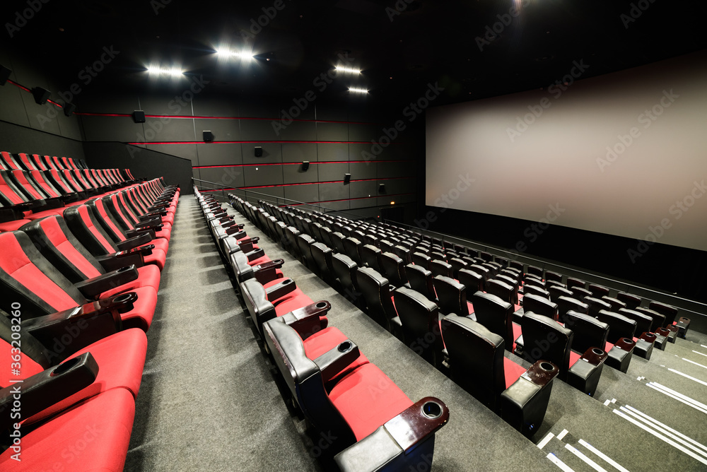 Cinema empty screen. audience with empty seats. Mock up - obrazy, fototapety, plakaty 
