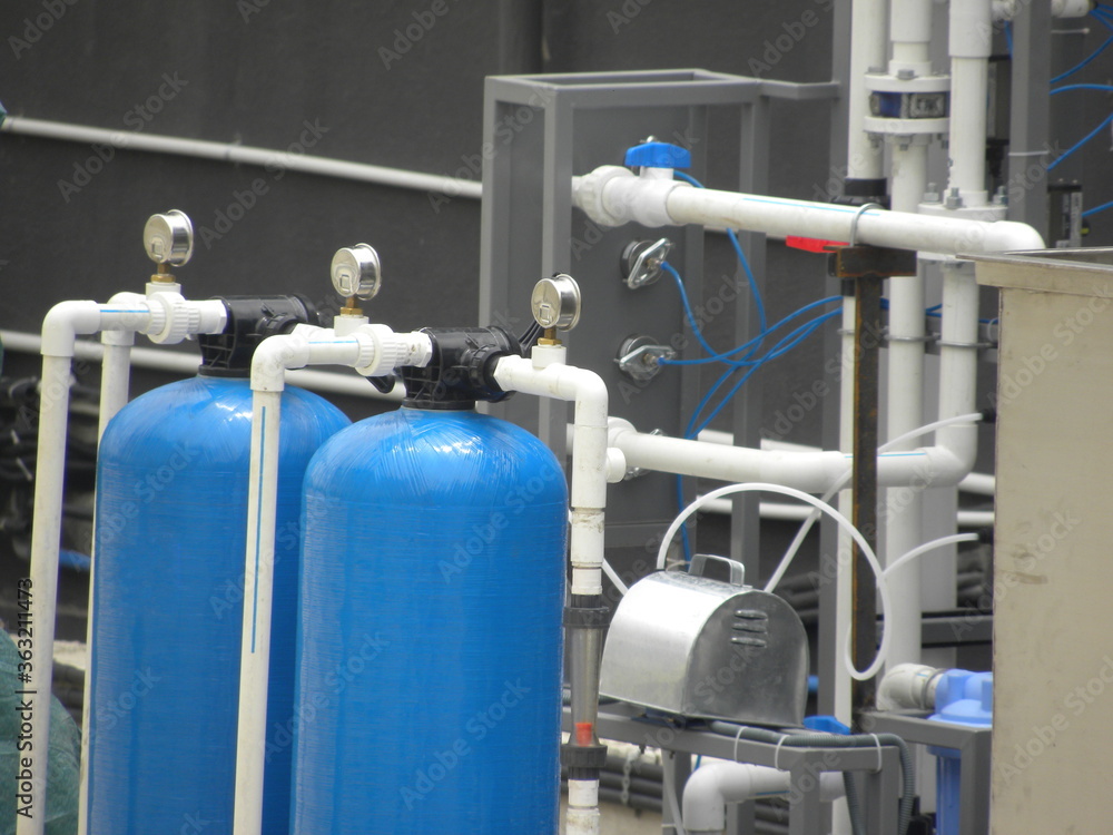 Blue color cylinders of water treatment and filtration system Blue color cylinders of water treatment and filtration system