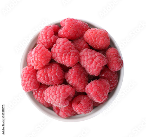 Delicious fresh ripe raspberries in bowl isolated on white, top view