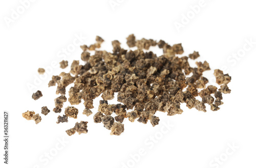 Pile of raw beet seeds on white background. Vegetable planting
