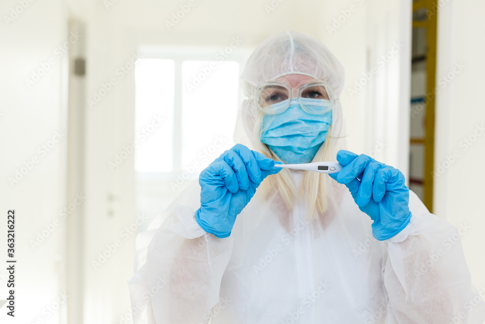 Chinese woman weared in protective suit. Gas mask as a protection against many infections and allergens. Health care worker. Chinese woman weared in protective suit. Gas mask as a protection against many infections and allergens. Health care worker.