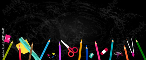 Back to school horizontal banner with blackboard and school supplies, compasses, colored crayons, erasers, scissors, paper clips, sharpeners, ruler, push pin