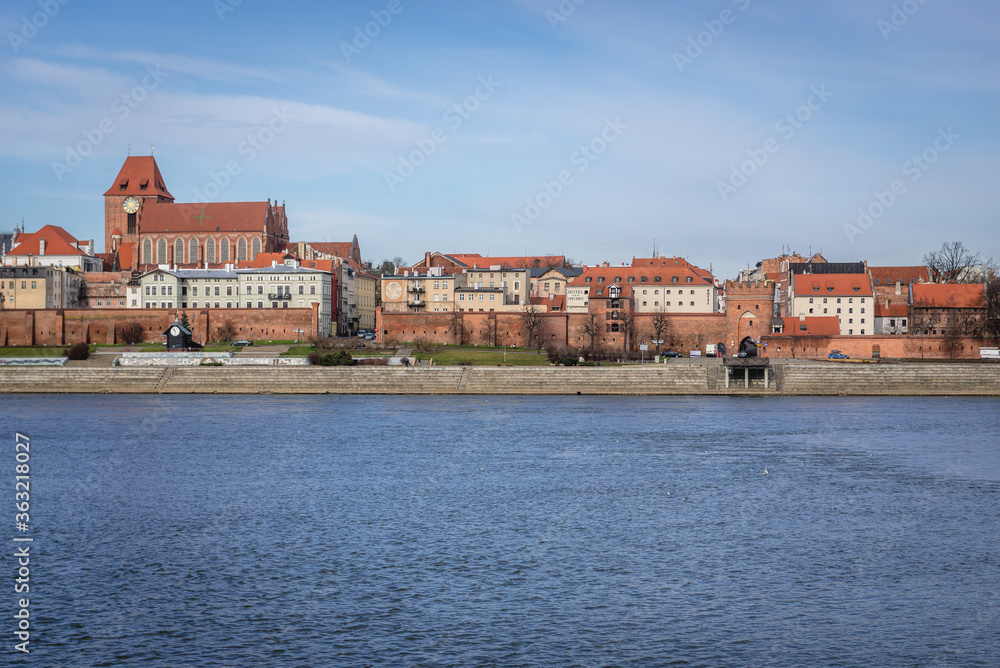 Cityscape of Torun city on the bank of Vistula River, Poland - view on the Old Town area