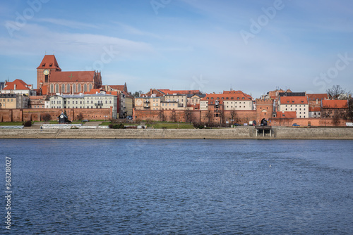 Cityscape of Torun city on the bank of Vistula River, Poland - view on the Old Town area photo