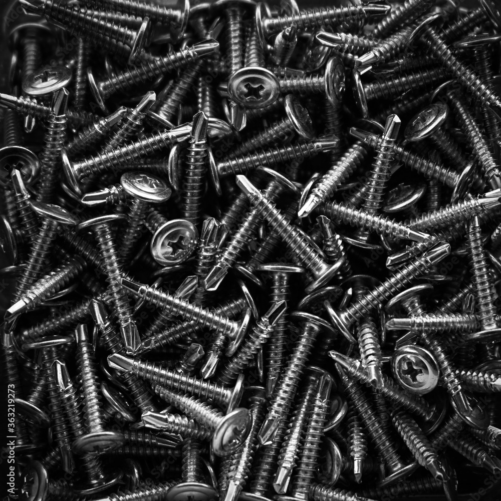Closeup of steel screws background Closeup of steel screws background