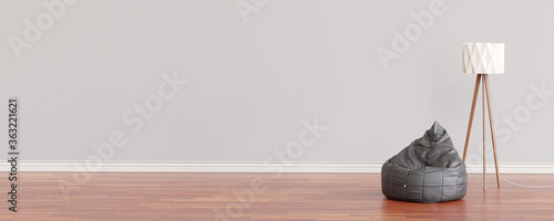 Canvastavla Room with floor lamp and black pouf