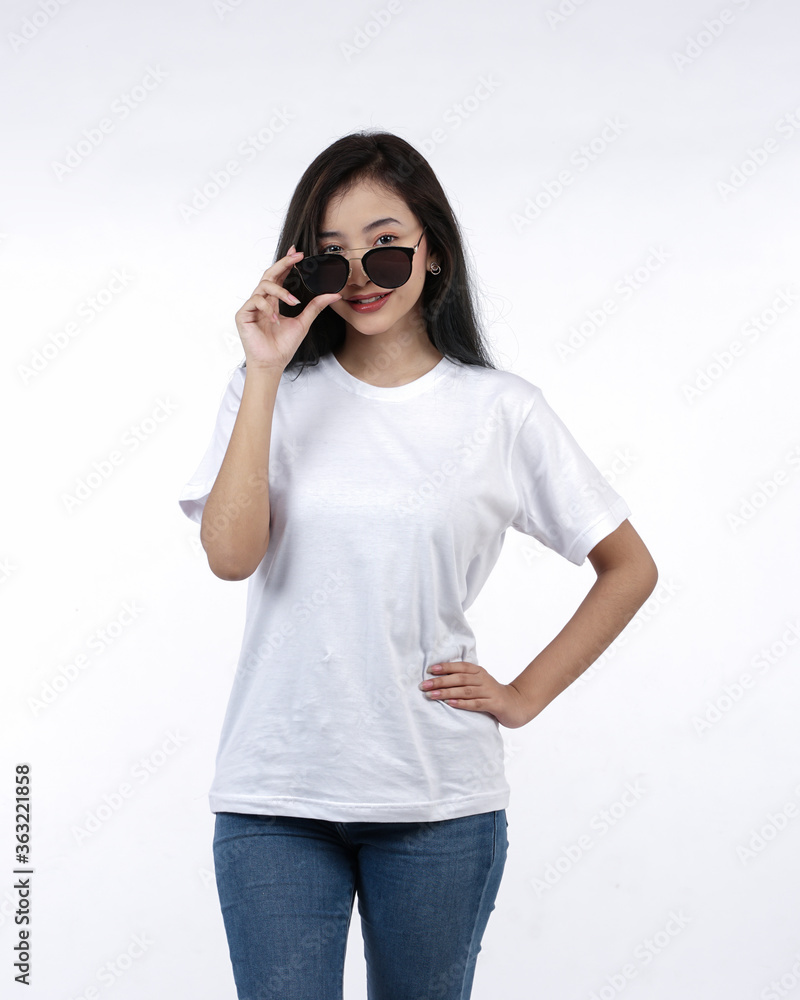 Front view white t-shirt Closeup on female body, woman girl in empty white t-shirt isolated on white background. Design woman t-shirt template and mockup for print.