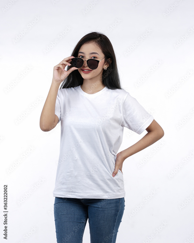 Front view white t-shirt Closeup on female body, woman girl in empty white t-shirt isolated on white background. Design woman t-shirt template and mockup for print. Front view white t-shirt Closeup on female body, woman girl in empty white t-shirt isolated on white background. Design woman t-shirt template and mockup for print.