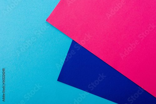 abstract geometric background with pink, blue paper