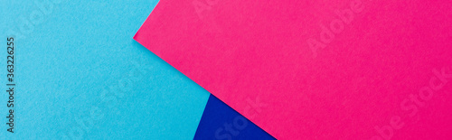abstract geometric background with pink, blue paper, panoramic shot