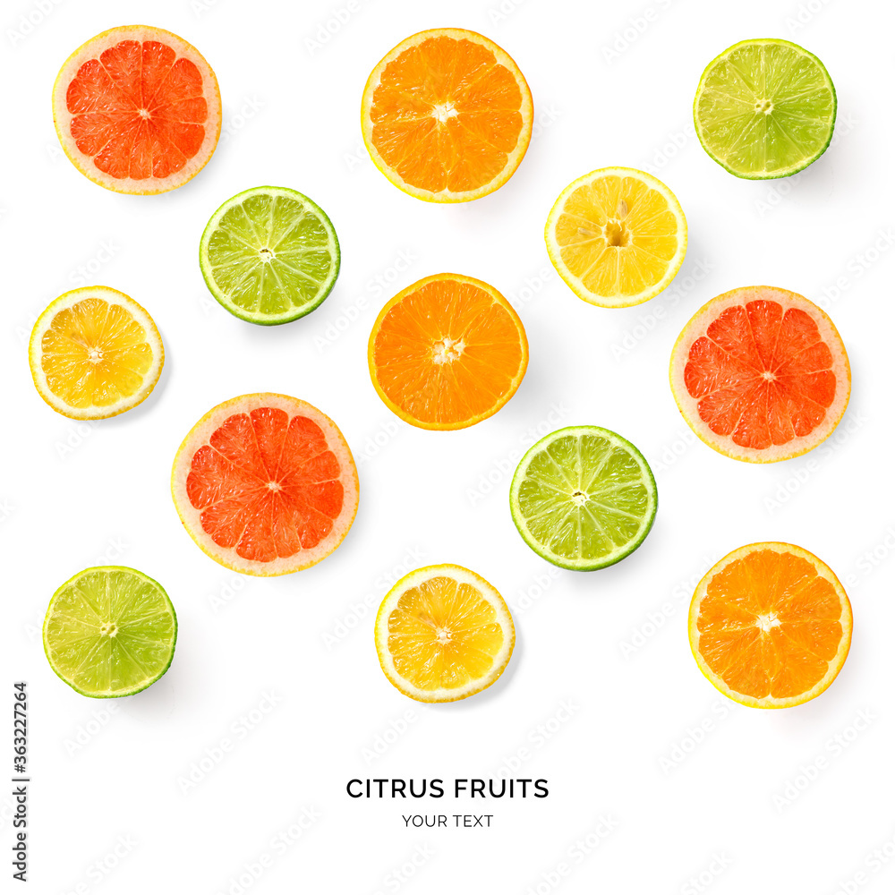Obraz premium Creative pattern made of lemon, lime, orange and grapefruit. Flat lay. Food concept. Lemon, lime, orange and grapefruit on white background.