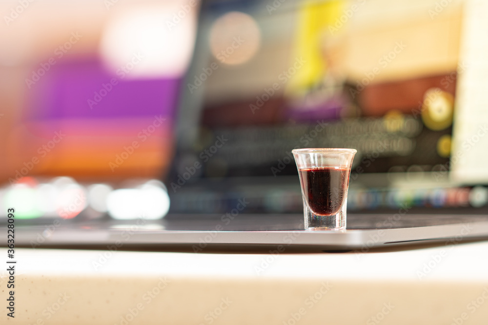 A Christian man is involved in holy communion by the online church at his house: Sunday service online. A Christian man is involved in holy communion by the online church at his house: Sunday service online.