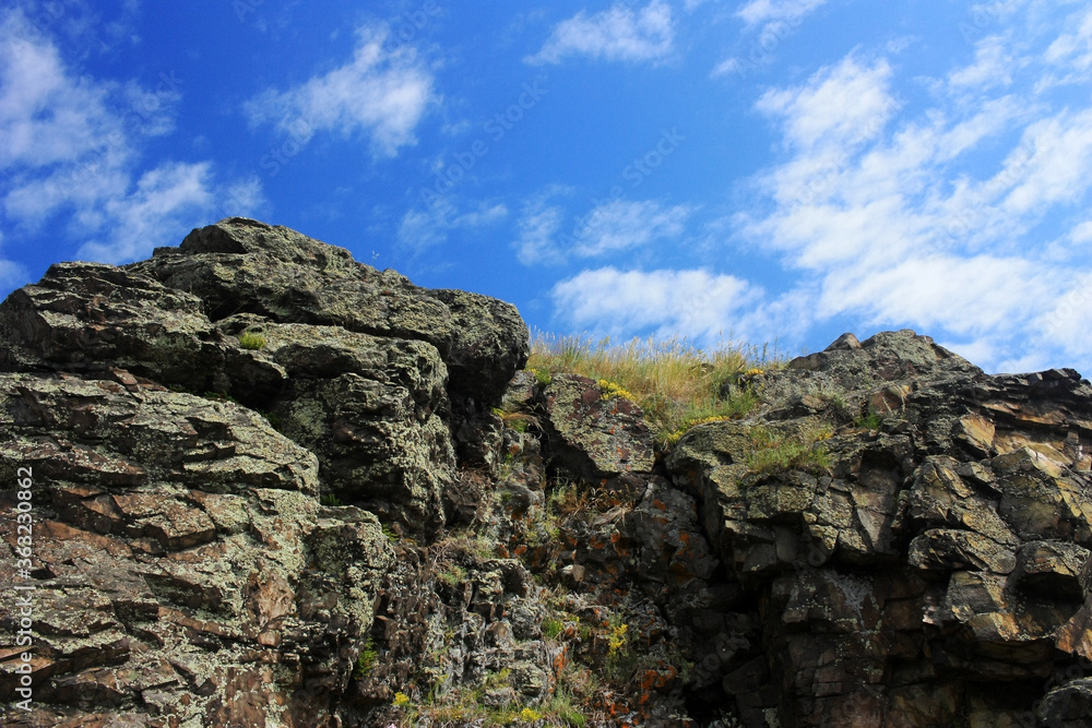 Granite rocks against the blue sky Granite rocks against the blue sky