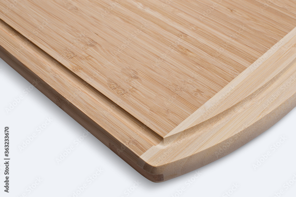 Wooden cutting board on a white background Wooden cutting board on a white background