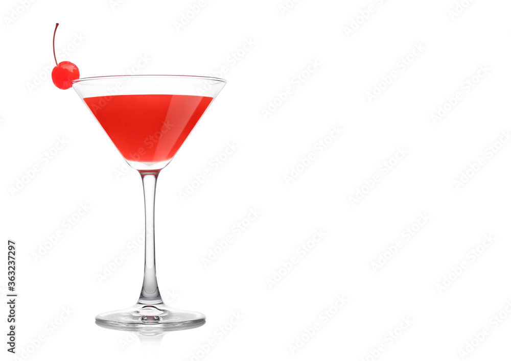 Cosmopolitan cocktail in classic crystal glass with pink cherry on white. Cosmopolitan cocktail in classic crystal glass with pink cherry on white.