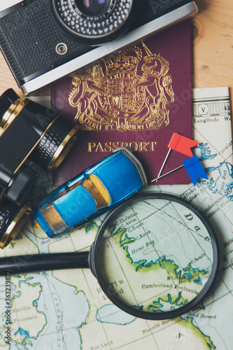 Road trip travel planning background with map and passport