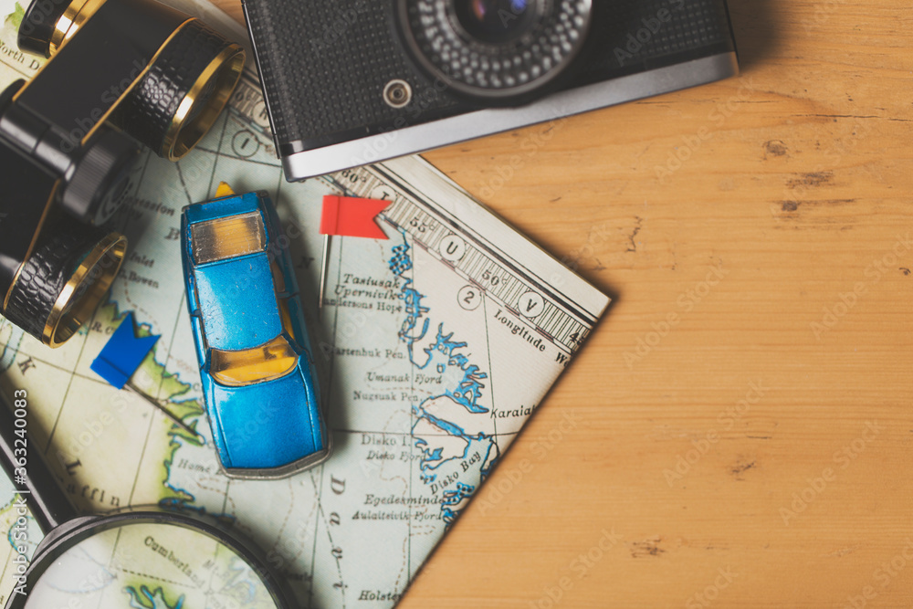 Road trip travel planning background with map and car