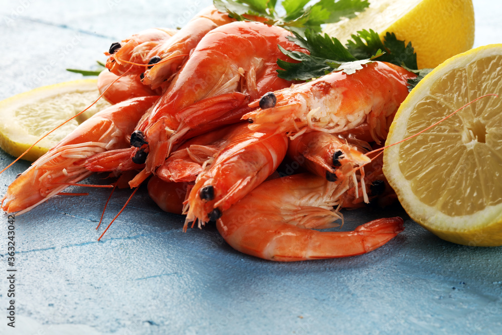 Raw fresh Prawns Langostino Austral. shrimp seafood with fresh lemon and spices. Raw fresh Prawns Langostino Austral. shrimp seafood with fresh lemon and spices.