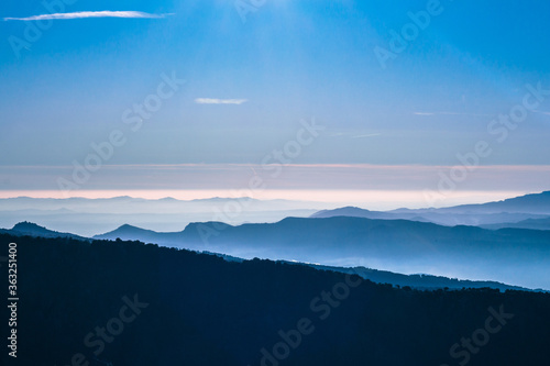 Nature landscape mountains and clouds, blue sky travel photo