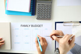 Family income and expenses budget planning. Man and woman make family budget concept