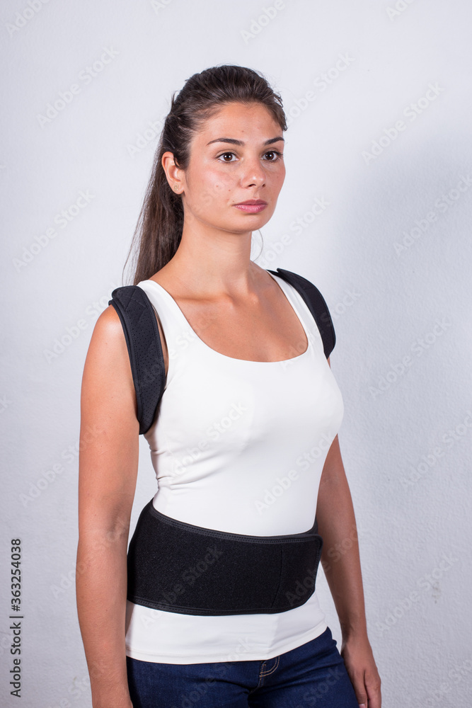 Instruction how to wear posture corrector. Different angels. Women wearing back support belt for support and improve posture consists of two parts for the back and lower back. Details, quality