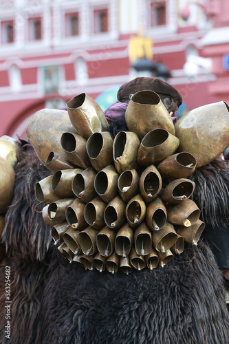 Moscow Maslenitsa Festival 2020. Traditional celebration in folk style. Sardinian masked artists: mamuthones, isohadores from Sardinia, Italy. Ethnic clothes, costumes photo