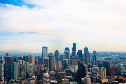 City Skyline of Seattle Washington USA.Seattle on the Puget Sound  became a commercial centre and a gateway to Alaska during the Klondike Gold Rush. The city became a technology hub in the 1980s. photo
