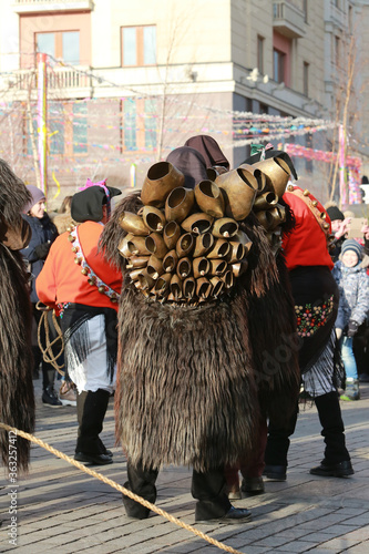 Moscow Maslenitsa Festival 2020. Traditional celebration in folk style. Sardinian masked artists: mamuthones, isohadores from Sardinia, Italy. Ethnic clothes, costumes photo