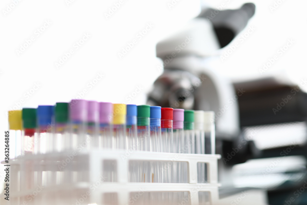 Laboratory with test tubes and microscope for research. Science experiments startup concept Laboratory with test tubes and microscope for research. Science experiments startup concept
