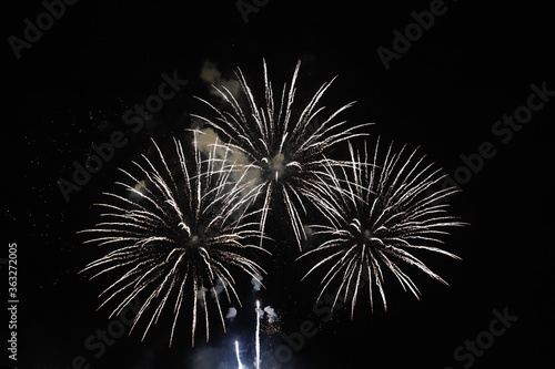 Fireworks with a dark black background  Bright beautiful colorful firework. Festive concept.