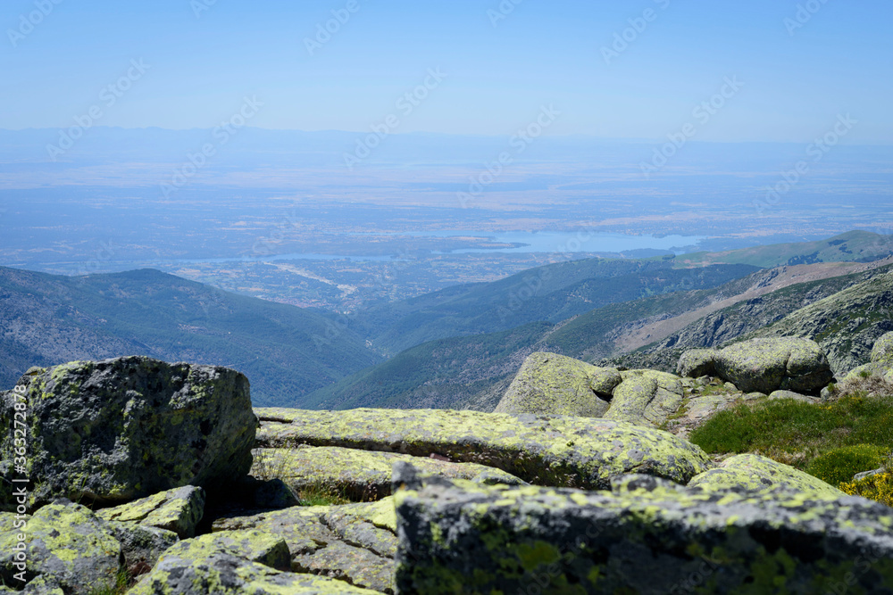 Landscape with mountains overlooking the lakes from the top of the stones in the Sierra de Gredos, Avila, Castilla Leon, Spain, Europe. Natural scene.
