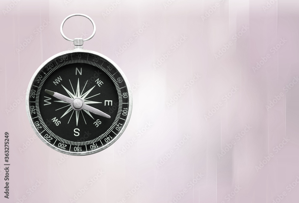round compass on abstract background as symbol of tourism with compass, travel with compass and outdoor activities with compass