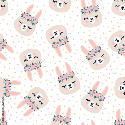Cute seamless spring pattern with sleeping rabbits heads, hearts. Hand drawn background with animal for children.