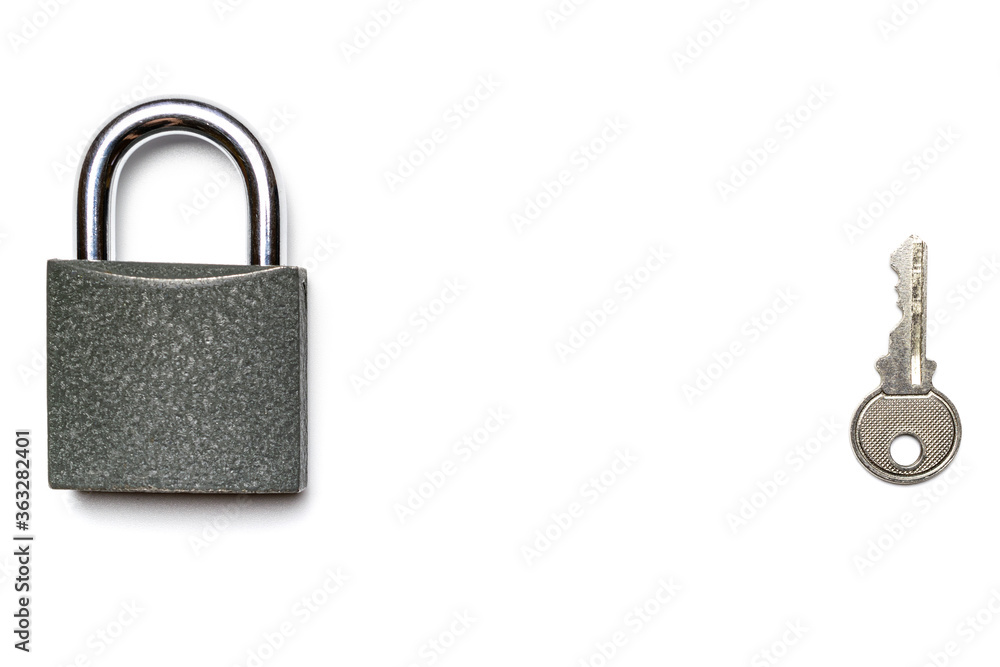 Security padlock. Metal lock pad with key isolated on white background. Security padlock. Metal lock pad with key isolated on white background.