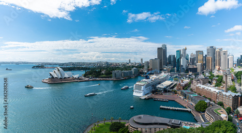 Panorama view of Sydney harbor bay and Sydney downtown skyline with opera house in a beautiful afternoon, Sydney, Australia. © kanonsky