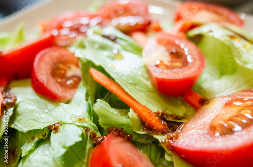 salad with red tomato and green lettuce