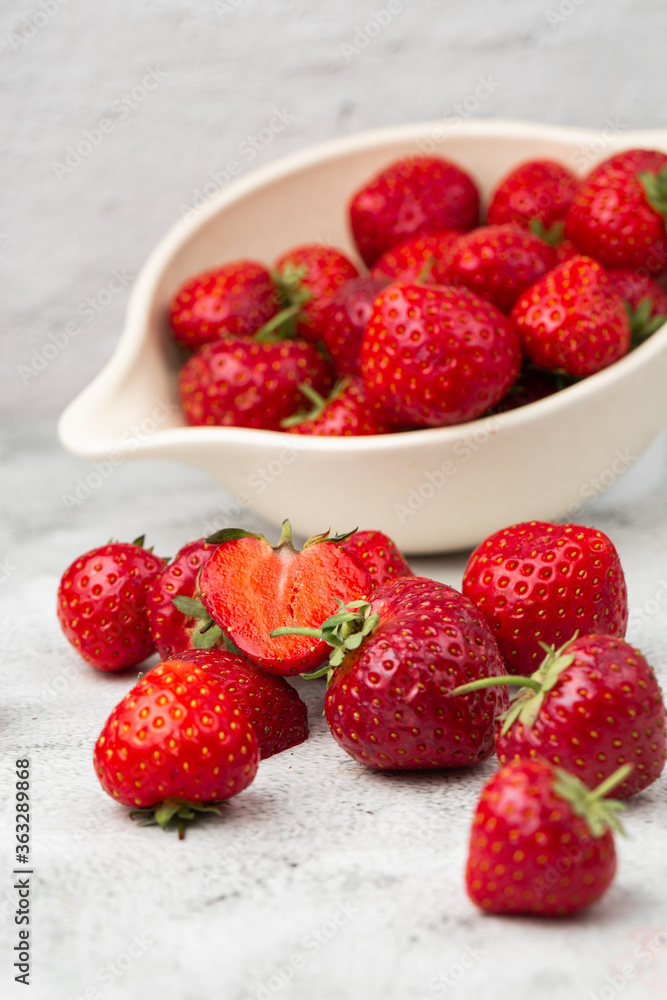 Fresh strawberries in a bowl on marble white table. Fresh nice strawberries. Strawberry field on fruit farm. Heap of Red strewberry on plate close up. Juice strawberry. Strawberry field on fruit farm. Fresh strawberries in a bowl on marble white table. Fresh nice strawberries. Strawberry field on fruit farm. Heap of Red strewberry on plate close up. Juice strawberry. Strawberry field on fruit farm.